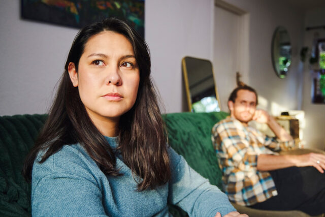 upset couple on couch