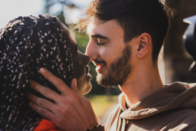 close-up of romantic couple kissing